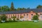 Orangerie and surrounding garden at Schwetzingen palace in Germany during sunny summer day