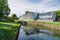 Orangery of Palmse manor and reflection in water canal