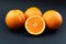 Oranges on black background