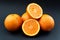 Oranges on black background