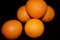 Oranges on a black background