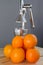 Oranges and chrome citrus juicer
