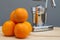 Oranges and chrome citrus juicer