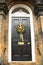 Oranges and cinnamon wreath on a black door