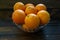 Oranges freshly picked off the three ready to be eaten on the kitchen table.