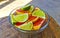 Oranges limes grapes lemon citrus grapefruit fruits on plate Mexico