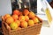 Oranges Next to a Fresh Squeezed Orange Juice Machine