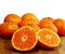 Oranges and one cut into halves sweet seedless oranges