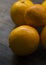 Oranges over wooden table