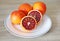 Oranges in the plate - tarocco blood orange - sanguine orange - red orange