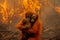 Orangutan family hugging each other in front of a fire