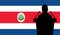 Orator Speaking From Tribune Costa Rica Flag Background. Public Speaker Speech In Costa Rica