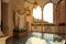 Oratory Santa Caterina in Fontebranda. The internal cloister, with a statue of the Saint.