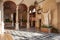 Oratory Santa Caterina in Fontebranda. The internal cloister, with a statue of the Saint.