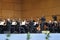 Orchestra conductor conducting the musicians of the Galicia Symphony Orchestra during an open-air concert