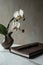 Orchid elegance on a work desk, enhancing office decor., AI Generated