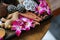 Orchid flower on wooden tray, Health care and spa concept. Nature spa ingredient