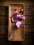 Orchid over wood dish