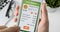 Ordering pizza using food delivery app on the smartphone