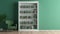 Orderly Symmetry: A White Bookcase In Front Of A Green Wall With A Chair