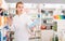 Ordinary pharmacist help in choosing at counter