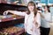 Ordinary women purchasing confectionery in shop