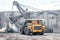 Ore loading with a powerful excavator. Loading a large mining truck.