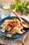 orecchiette with chopped tomato and parsley - traditional Italian food