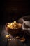 Orecchiette pasta in a bowl on wooden background