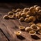 Orecchiette pasta on wooden background