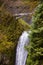 OREGON, USA - APRIL 17, 2017: The bridge over Multnomah Falls with tourists in the Columbia River Gorge, Oregon