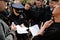 Orel, Russia - April 28, 2017: Drivers meeting. Policeman looking at protester papers