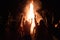 Orel, Russia - June 25, 2022: Solstice Kupala bonfire round dance hands up