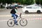 Orel, Russia - May 28, 2017: Bikeday. Bicyclist riding alone stop tape