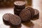Oreo cookies on dark brown background