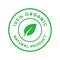 Organic 100 percent natural product green circle sticker with leaf in center. Design element for packaging design and