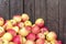 Organic apples stored in a wooden box