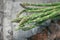 Organic Asparagus Against a Rustic Background