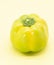 organic capsicum over on yellow color background