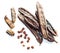 Organic carob pods with seeds on white background