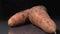 Organic carrot close-up. Black background. Fresh vegetables.