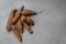 Organic Cassava root on gray background. Yucca