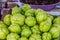 Organic Chayote fruits for sale in the market. Chayote Sechium edule is an edible plant that also known as christophine, cho-cho