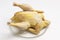 Organic clean food concept. Uncooked gutted carcass of broiler chicken with yellowish skin, grown by free range method outdoors