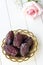 Organic dried dates in traditional arabic golden plate. Holy month Ramadan concept. Top view