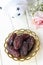 Organic dried dates in traditional arabic golden plate. Holy month Ramadan concept. Top view