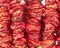 Organic dried tomatoes close up, natural vegan food background