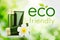 Organic eco friendly cosmetic products on green, bokeh effect