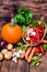 Organic food. Harvest of fresh vegetables.Autumn vegetables on a wooden table. Pumpkin season