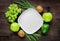 Organic food for homemade salad with green vegetables on wooden desk background top view mock-up